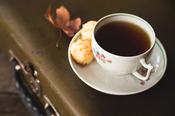 Cup of tea with cookies, vintage style