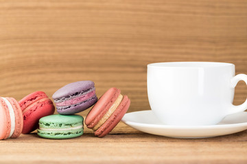 Stack Focus Image Of Colorful French Macarons On Wooden backgrou