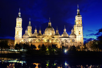 Fototapeta na wymiar Cathedral and Ebro river in Zaragoza. Aragon, Spain