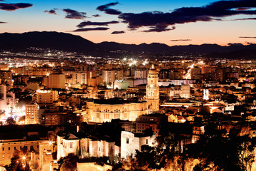 Obraz premium View over Malaga at night Andalusia Spain