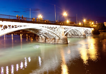 Bridge of Triana in Sevilla at night, Spain