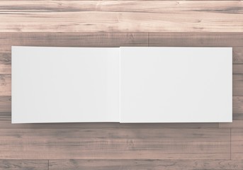 Magazin Doppelseite offen auf Holz