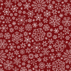 Christmas seamless doodle pattern with snowflakes