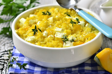 Spicy millet casserole with pumpkin and feta.