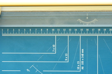 A paper guillotine, paper cutter with measuring features