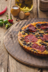 Delicious quiche with chorizo, nuts and sharp cheese