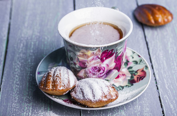French madeleines with cup of tea
