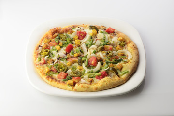 Pizza with Vegetable topping shot in studio 