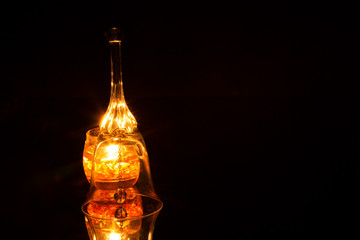 Ornate glass bell isolated on a black background