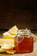 Honey with lemon, herbal medicine and healthy food concept, sele
