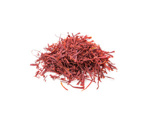 Dried saffron spices over white background