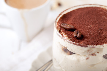 Tiramisu dessert in a glass. Traditional Italian.