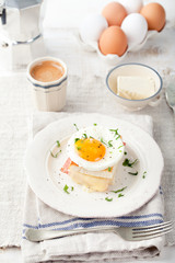 Croque madame, egg, ham, cheese sandwich. Traditional French cuisine. 