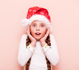 girl with pigtails in Santa Claus