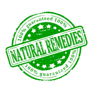 Damaged round green stamp with the words - natural remedies - vector svg