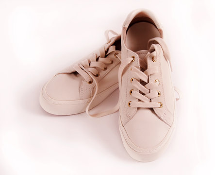 Leather sneakers on white background