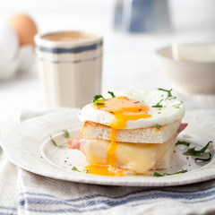 Croque madame, egg, ham, cheese sandwich. Traditional French cuisine. 