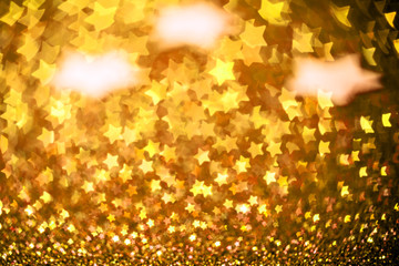 Festive Christmas background with stars. Abstract twinkled brigh