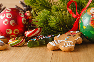 New year decoration on wood table with pine and red stars