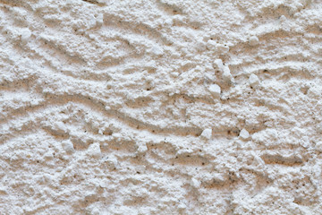 White wall background with heavy grunge patterns.