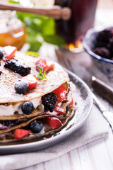 Homemade pancakes with berry fruits