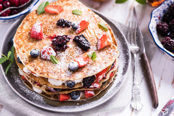 Homemade pancakes with berry fruits