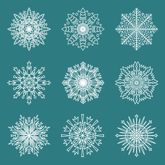 Set of 9 hand drawn symmetric white snowflakes