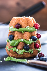 Christmas tree made from cake, fruits and frosting