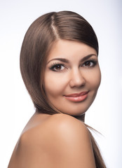 Fototapeta premium Portrait of charming smiling fair-haired girl, it is isolated on white 