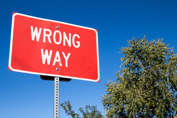 Red wrong way sign