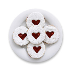 Pastries with jam heart on a plate