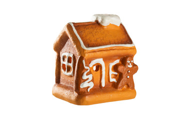 House christmas decoration and gingerbread man isolated on white
