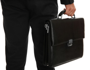 Elegant man in suit with briefcase isolated on white