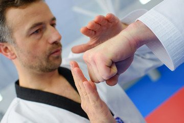 Obraz premium Kid in a karate lesson