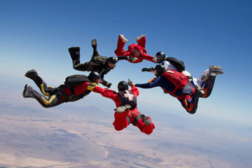 Skydiving star teamwork - obrazy, fototapety, plakaty