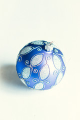 Christmas ornament on white wooden background