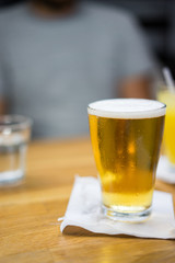 Glass of draft beer in cafe