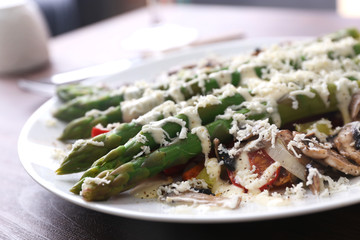 Delicious vegetables dish on served wooden table, close up