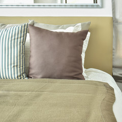 Light brown color scheme bedding with light brown headboard and