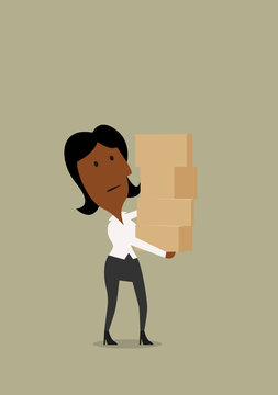 Businesswoman carrying a stack of boxes