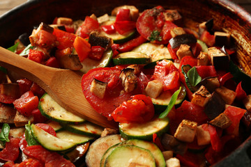 Tasty vegetarian ratatouille on pan, close-up