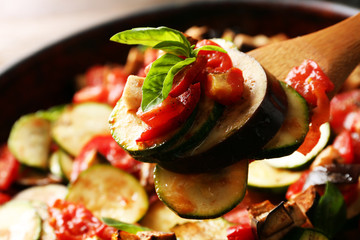 Tasty vegetarian ratatouille on pan, close-up