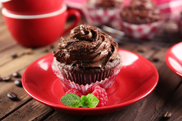 Chocolate cupcakes on saucer closeup