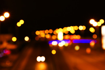 Illuminated night road, unfocused