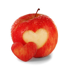 Obraz na płótnie Canvas Red apple with heart isolated on white
