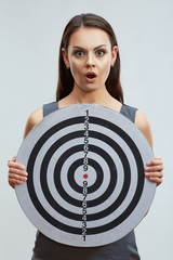 Emotinal portrait of business woman holding target, success emo