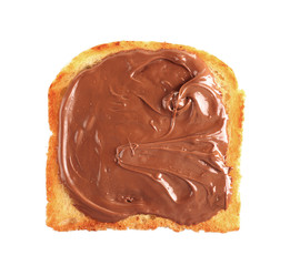 Chocolate poured on piece of bread isolated on white