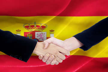 Handshake with flag of Spain