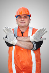 Mature contractor shows gesture
