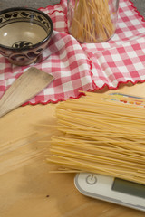Cooking Spaghetti on wooden table